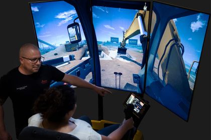 Impression vom letztjährigen Tag der Geomatik: Im Baggersimulator